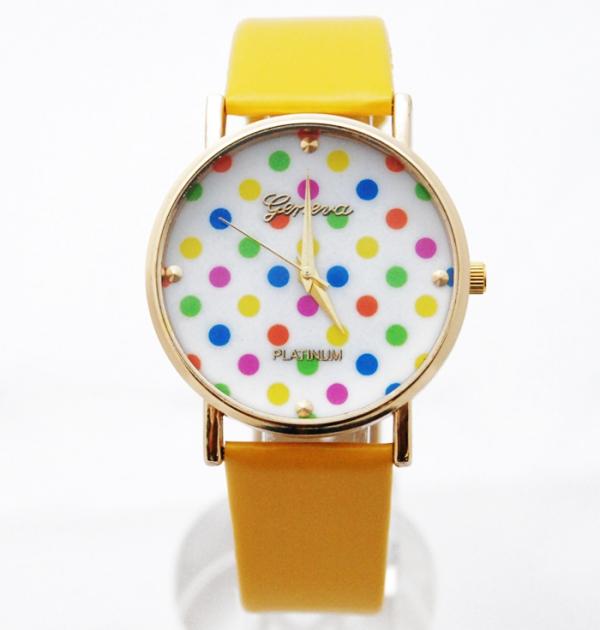 Жълт часовник с цветни точки